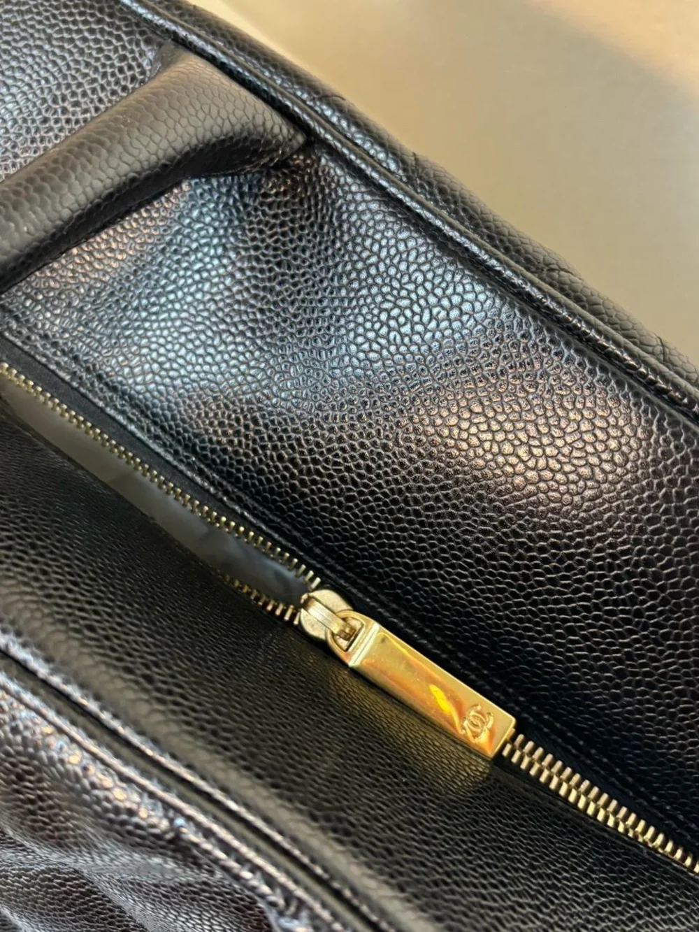 CHANEL Black Quilted Caviar Leather Tote with CC Emblem